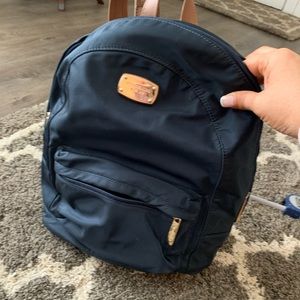 Michael Kors backpack purse, navy, zip closure